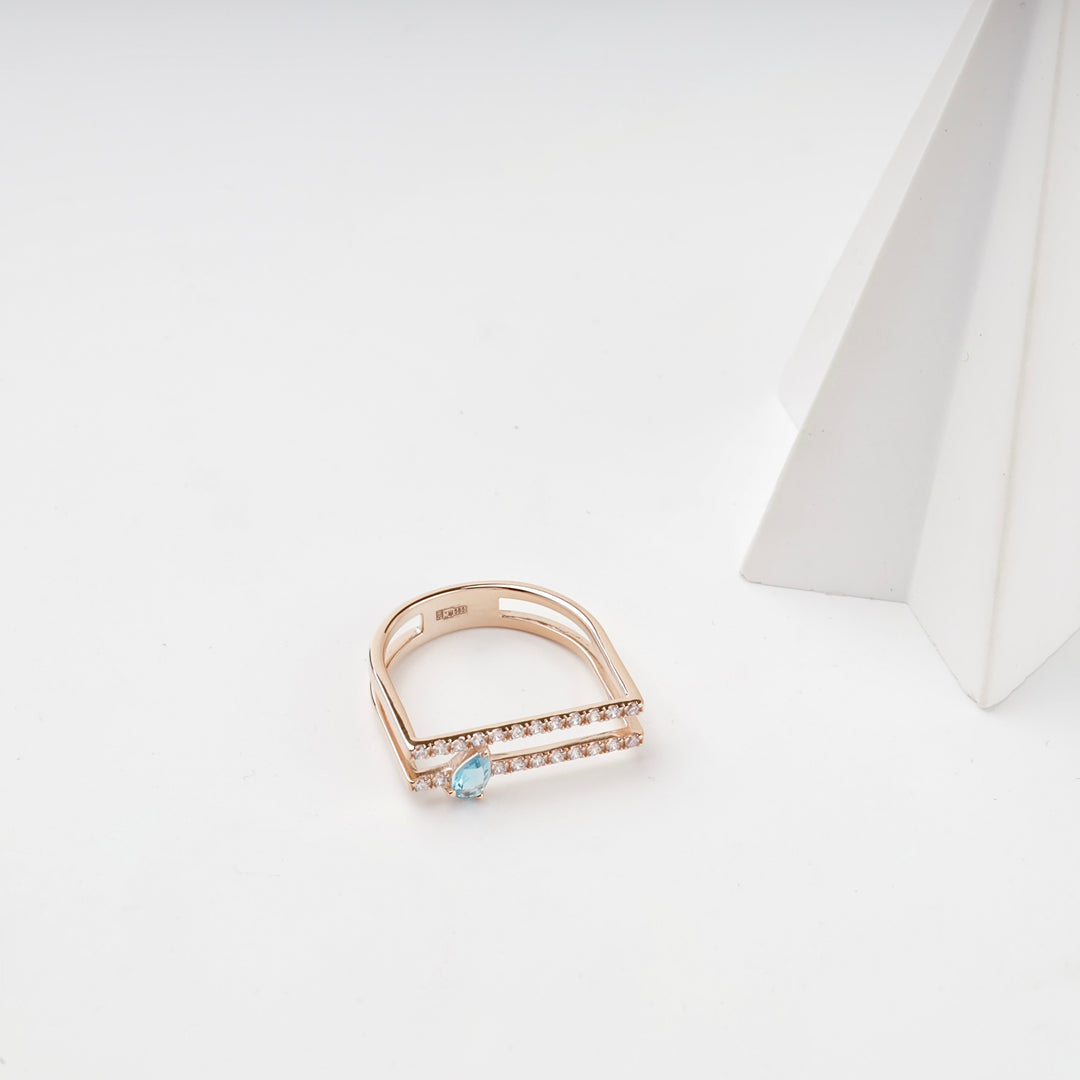 Open Ring with Blue Topaz and Cubic Zirconia | 14K Rose Gold (585) — angled view