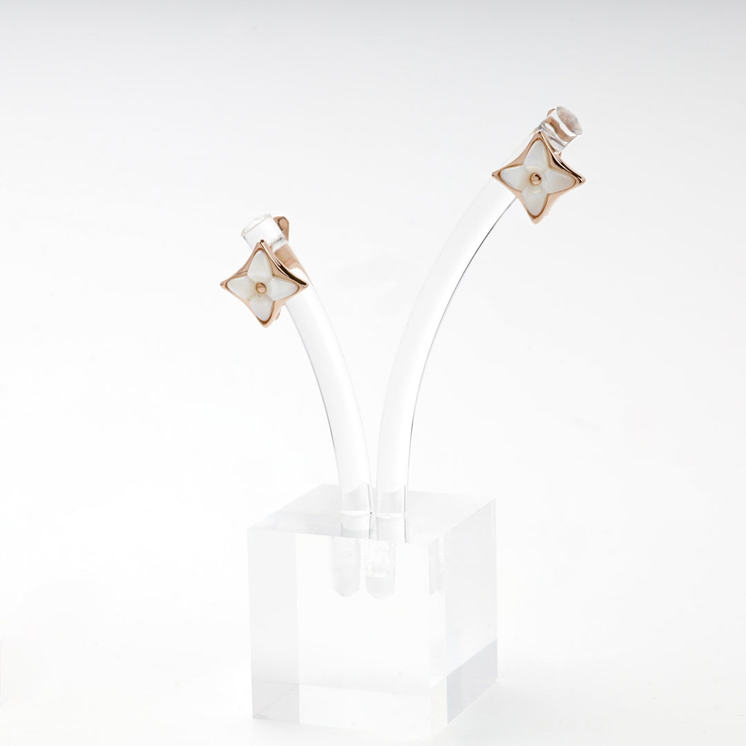 Rose gold star earrings with mother of pearl pair
