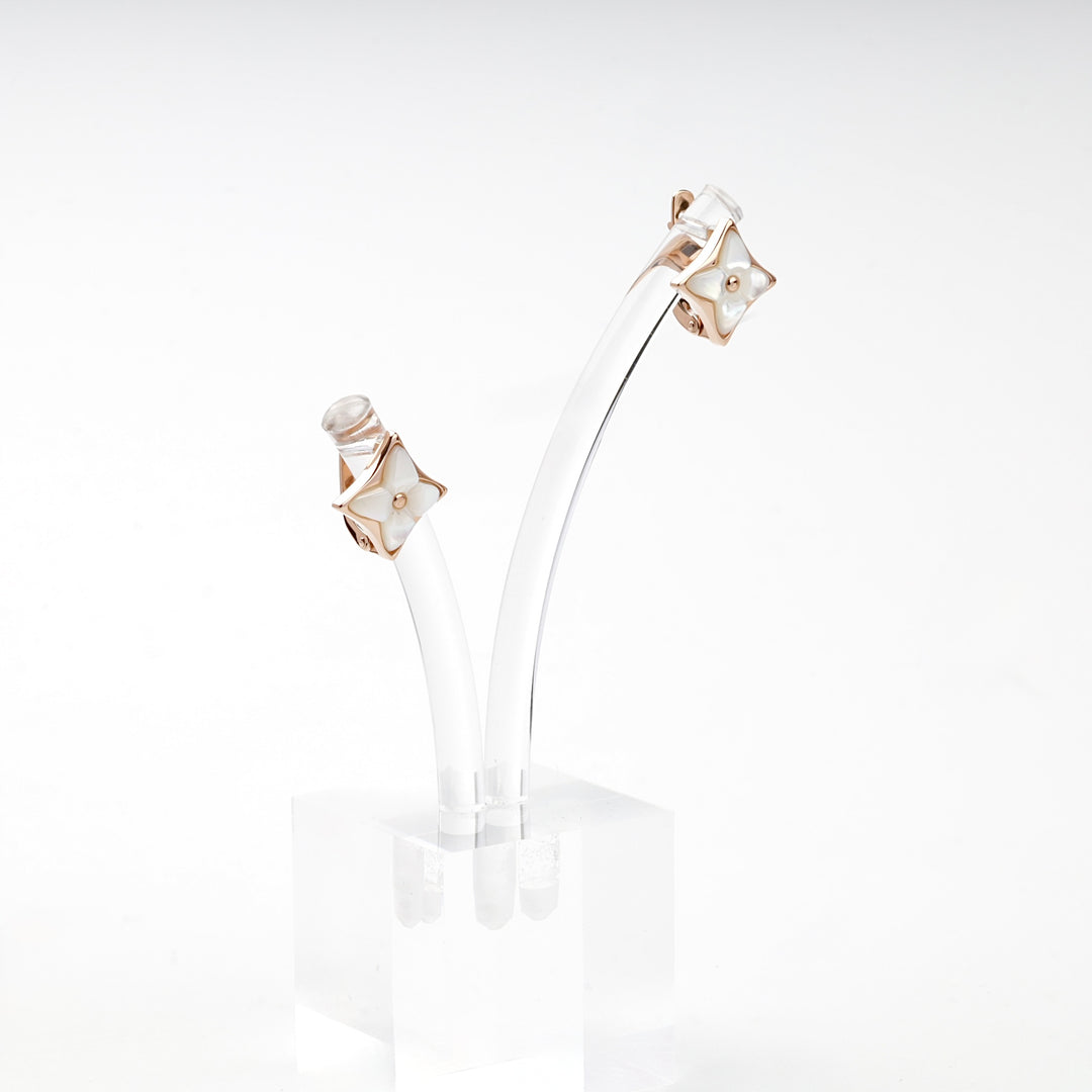 Rose gold star earrings product photo