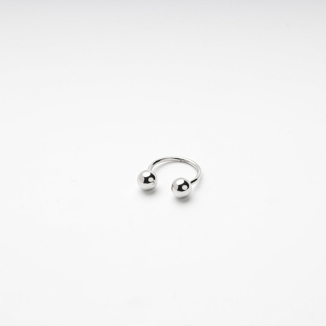 Sterling silver 925 open ring with two ball ends, standing upright