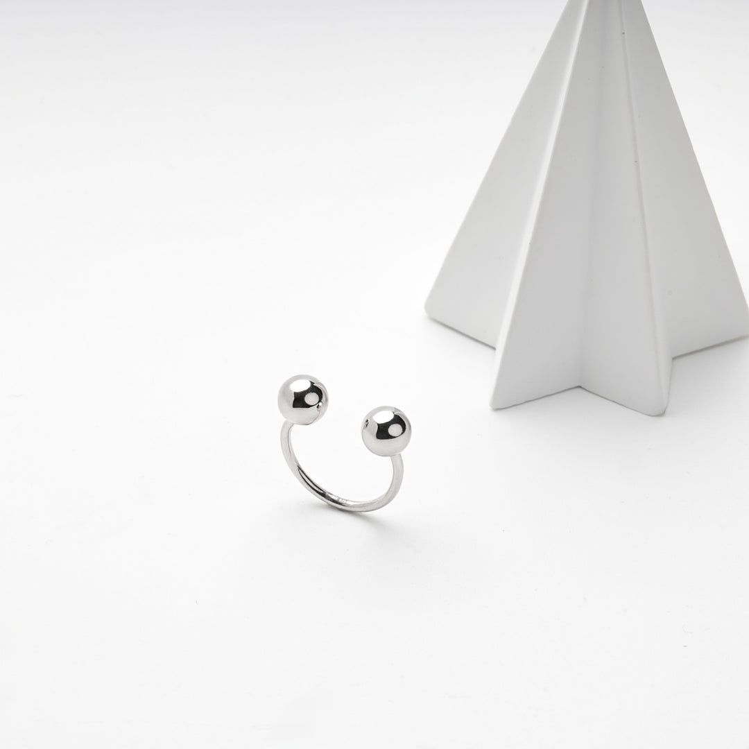 Silver 925 double ball ring showing the open gap between the balls