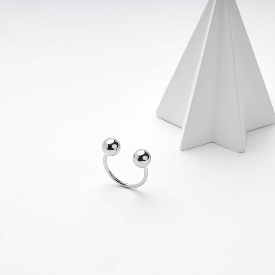 Silver 925 double ball ring showing the open gap between the balls