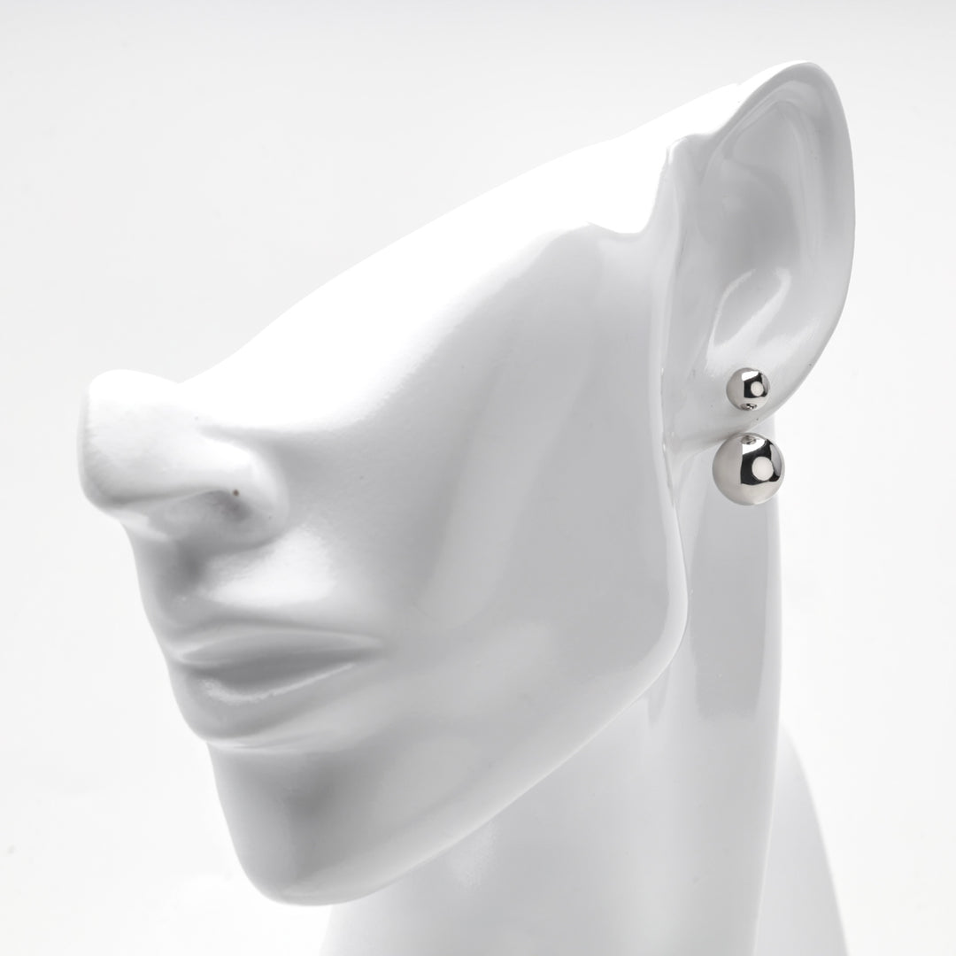 Ball duo earring shown on a white mannequin ear