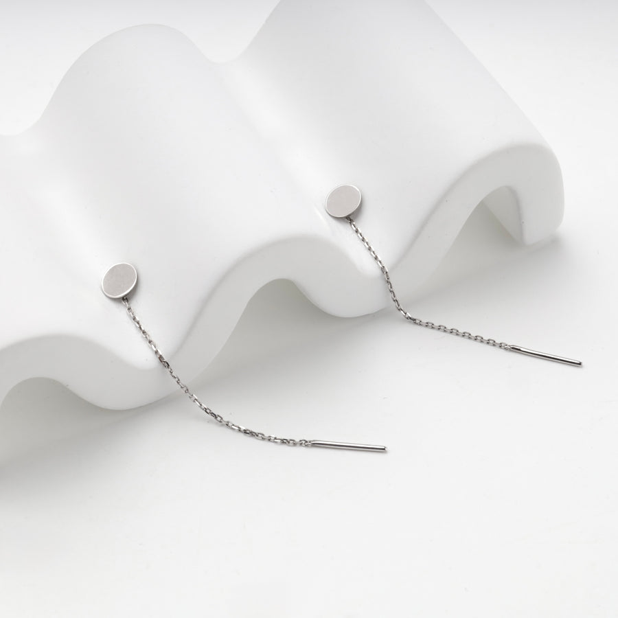 Silver 925 threader earrings with round discs, angled view