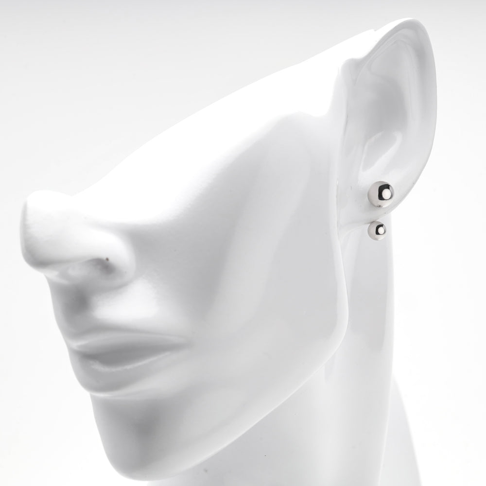 Silver 925 double ball earring shown on a white mannequin ear