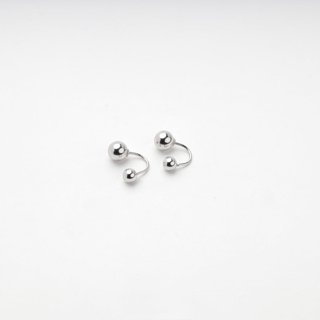 Pair of silver 925 double ball earrings on a white background