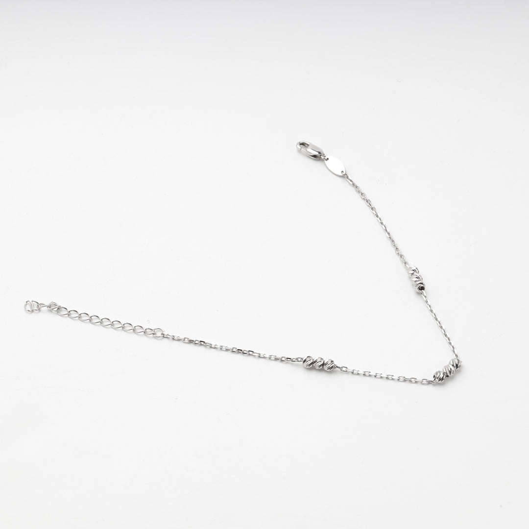 Sterling silver 925 bracelet with groups of diamond-cut beads on an anchor chain