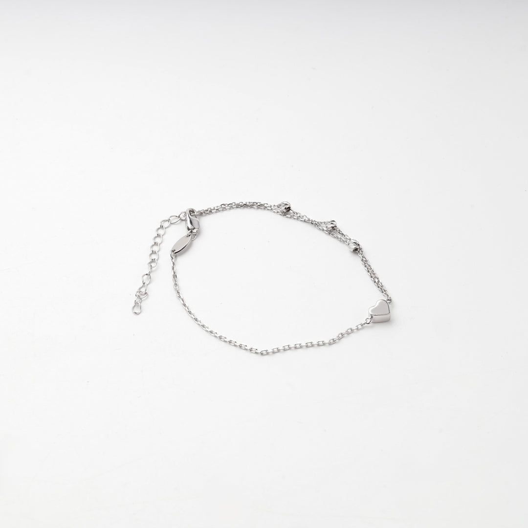 Sterling silver 925 double chain bracelet with a small heart and faceted beads