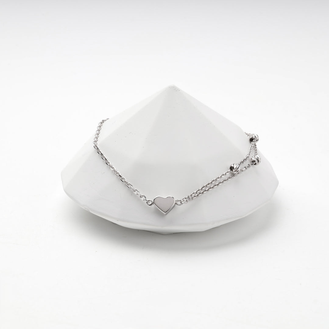Silver 925 double strand bracelet showing the diamond-cut beads