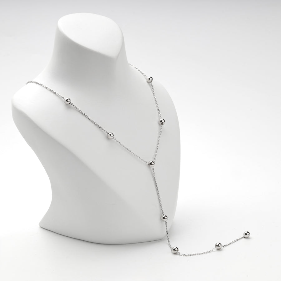 Silver 925 Y necklace with polished bead stations along the chain and drop