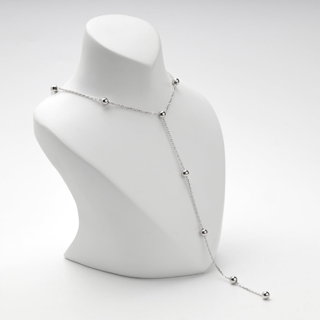 Silver 925 beaded necklace shown from the side on a display bust