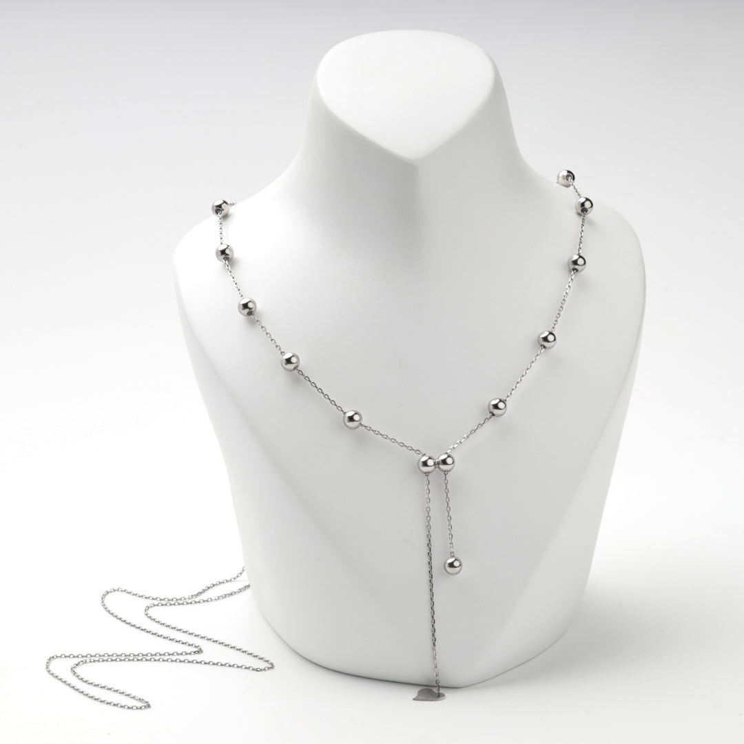 Close view of the bead stations on the silver 925 Y necklace