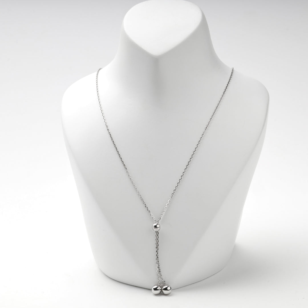 Front view of the silver bolo necklace at a short setting