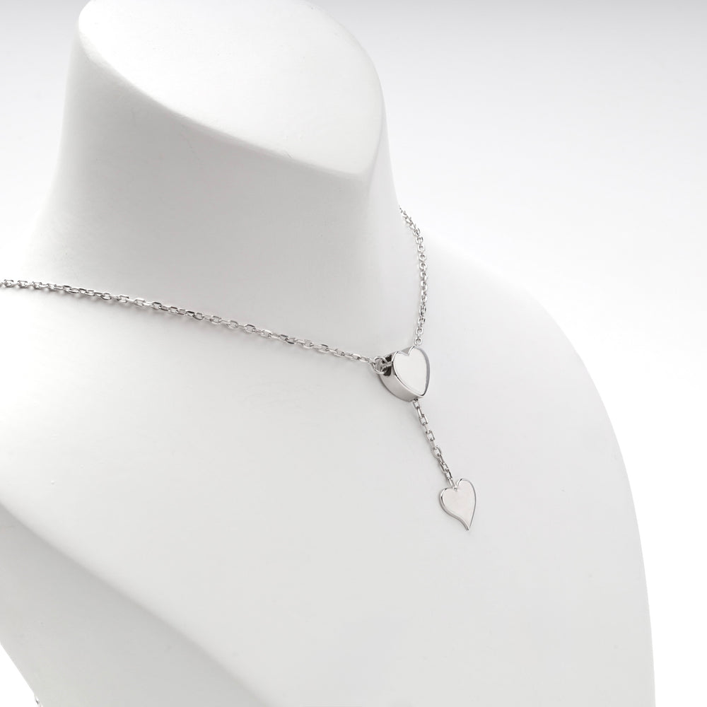 Close view of the upper heart where the chain splits into the drop