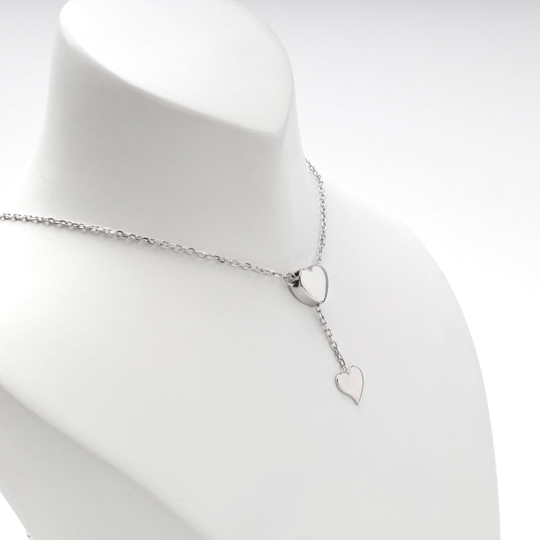 Close view of the upper heart where the chain splits into the drop