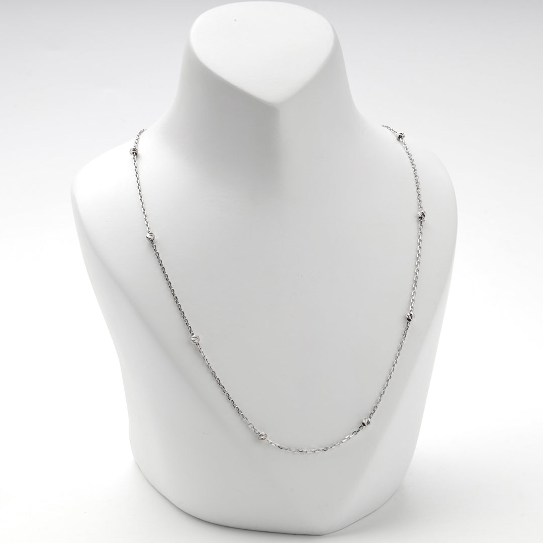 Silver 925 station chain necklace shown at full length on a white bust