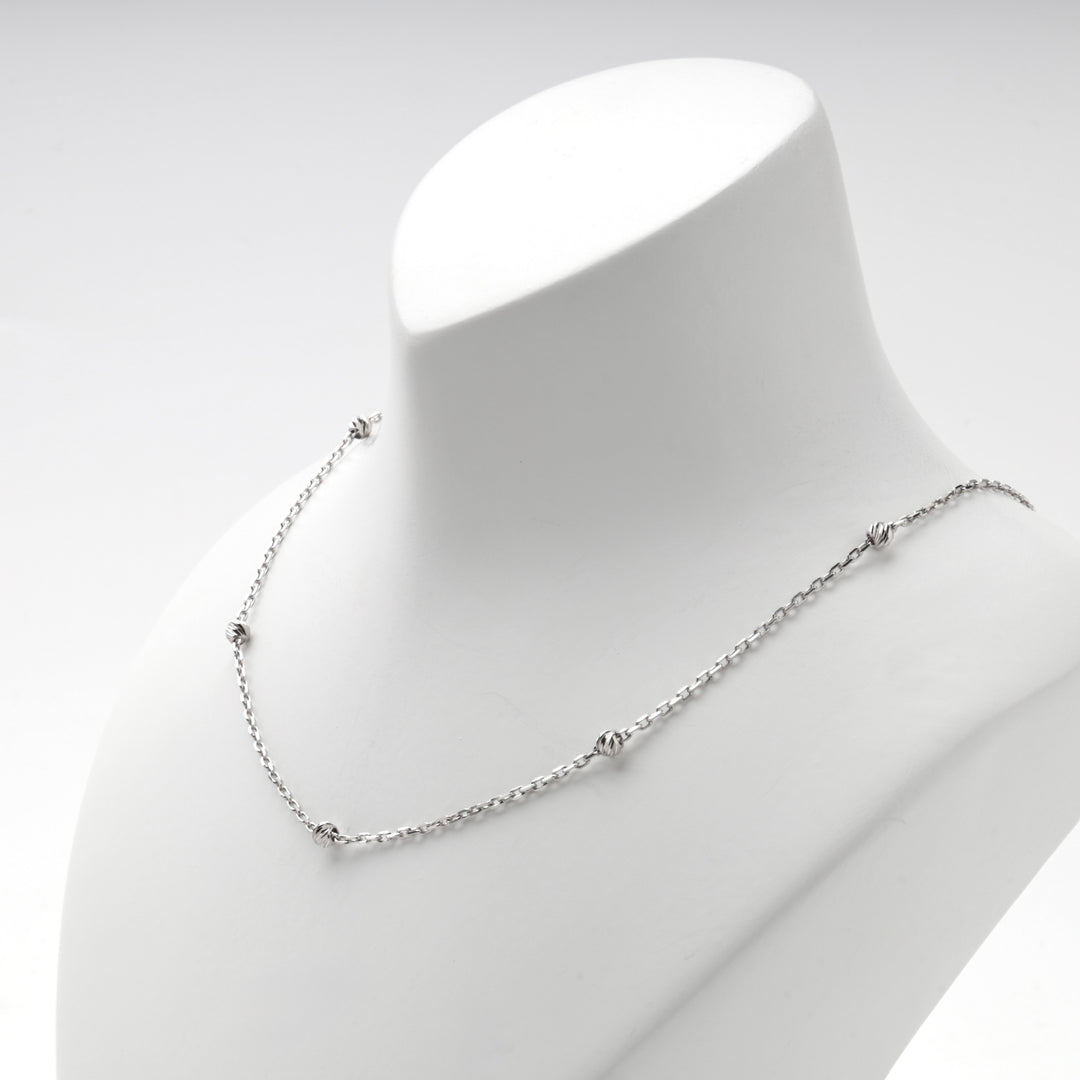 Silver 925 beaded necklace worn short at the collarbone