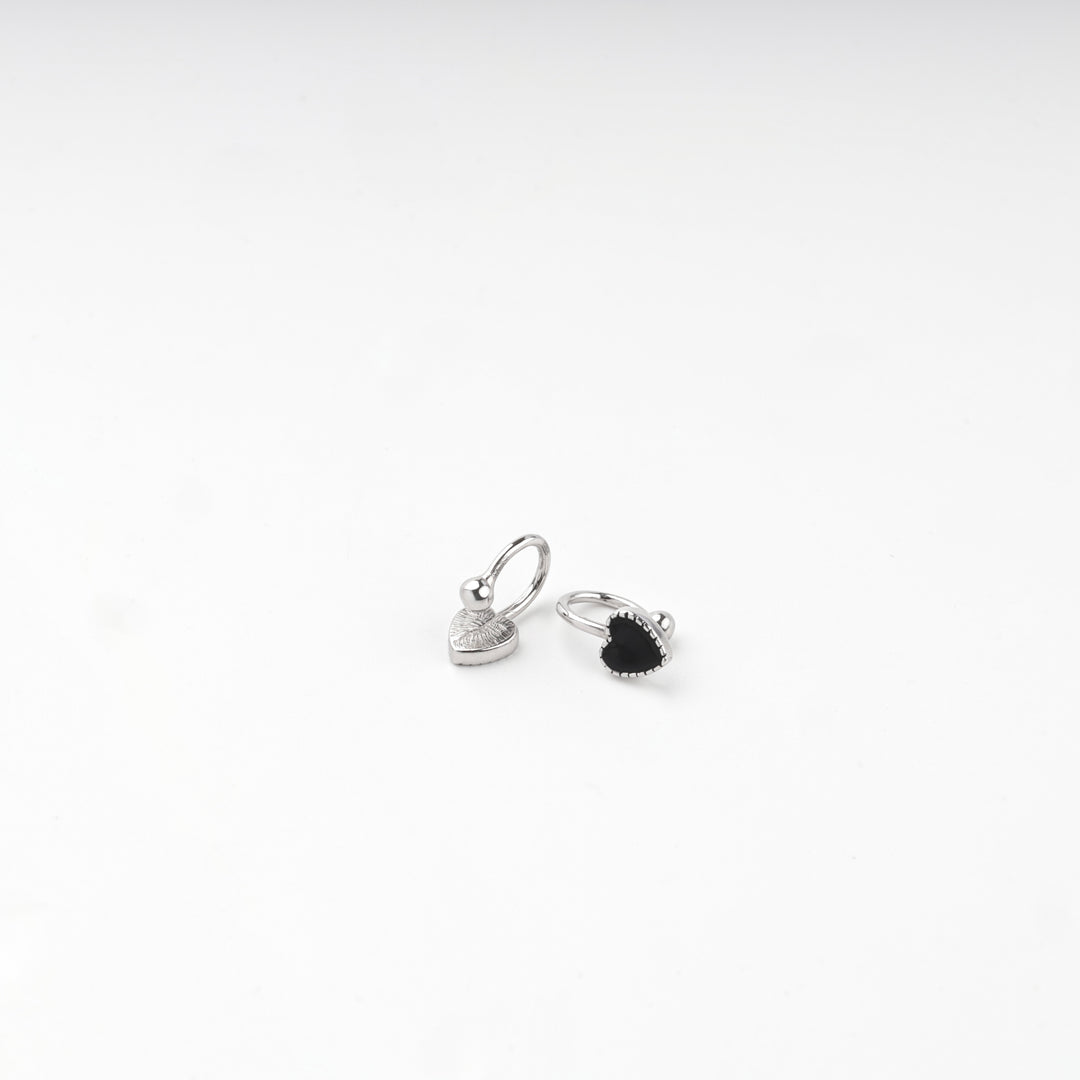 Silver 925 hoop earrings with black heart inserts, angled view