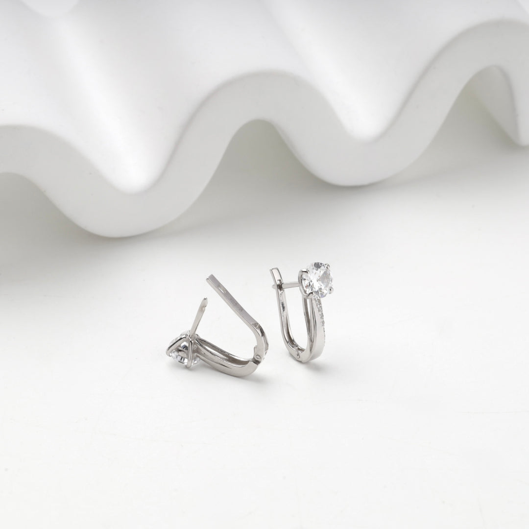 Silver 925 solitaire earrings shown from the front and the back