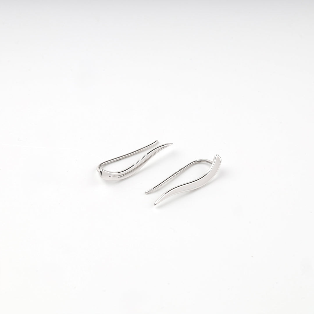 Silver 925 climber earrings shown from a raised angle