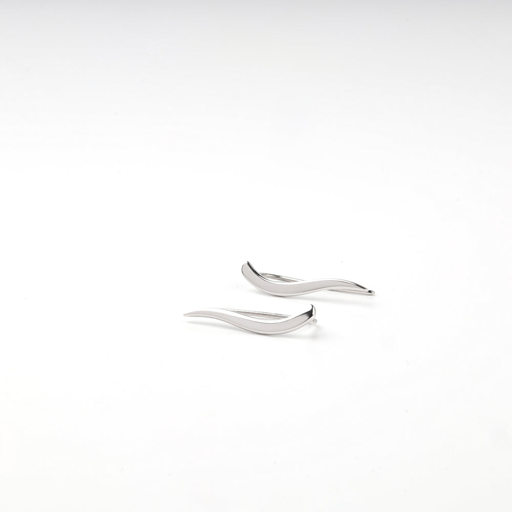 Tapered curved bars of the silver 925 climber earrings, top view