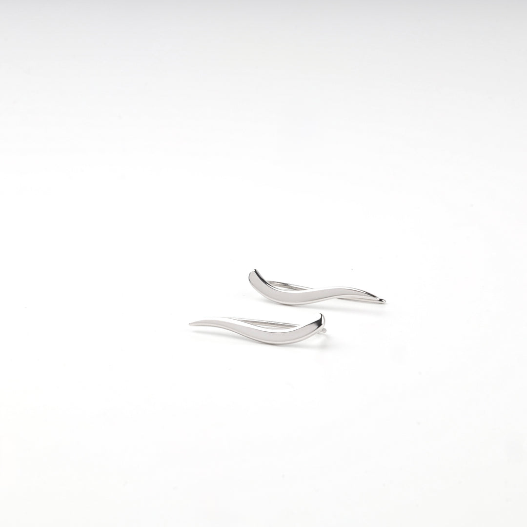 Tapered curved bars of the silver 925 climber earrings, top view
