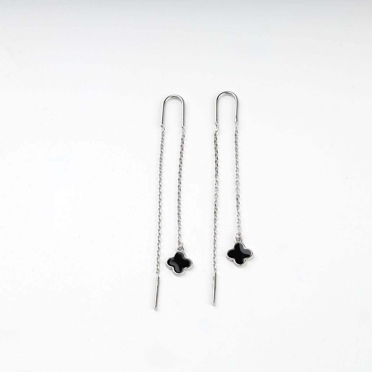 Pair of silver 925 threader earrings with black clover charms
