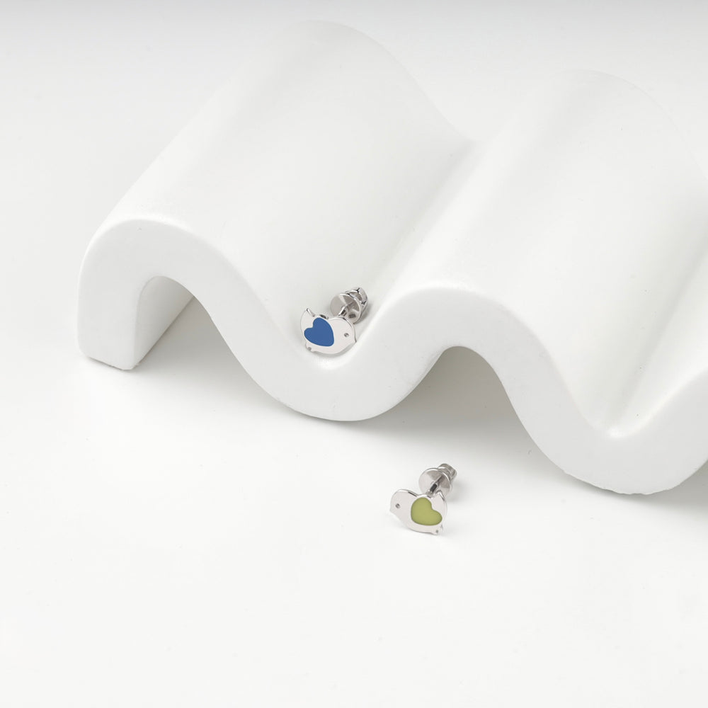 Blue enamel bird stud on the display and the yellow enamel stud below it