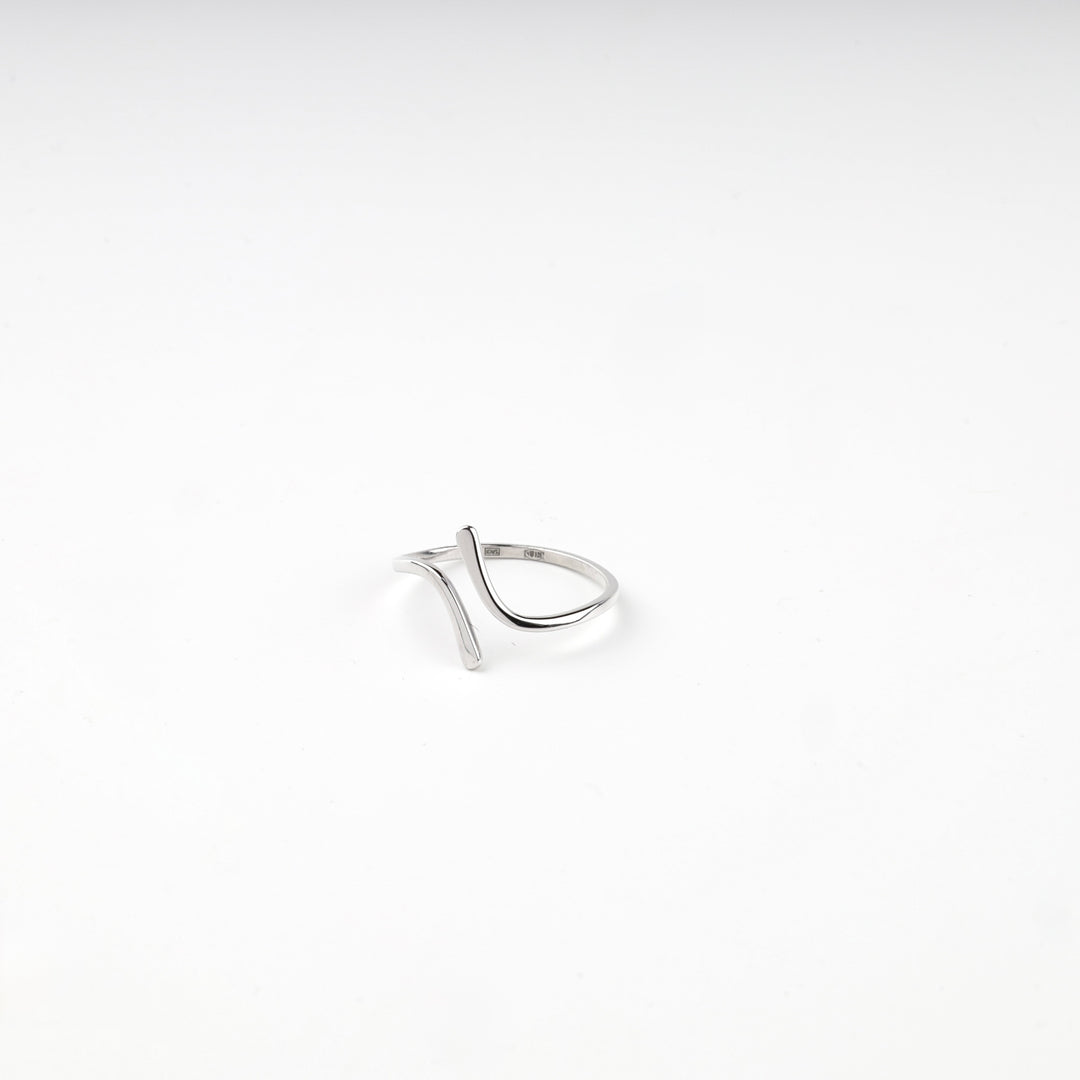 Sterling silver 925 bypass ring showing the two overlapping wave ends