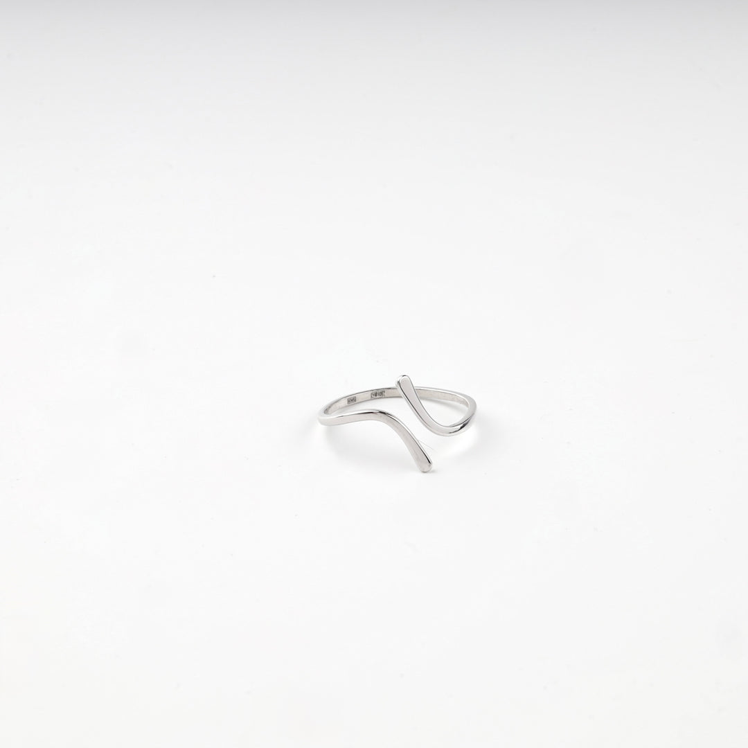 Top view of the silver 925 open wave ring with hallmarks stamped inside the band