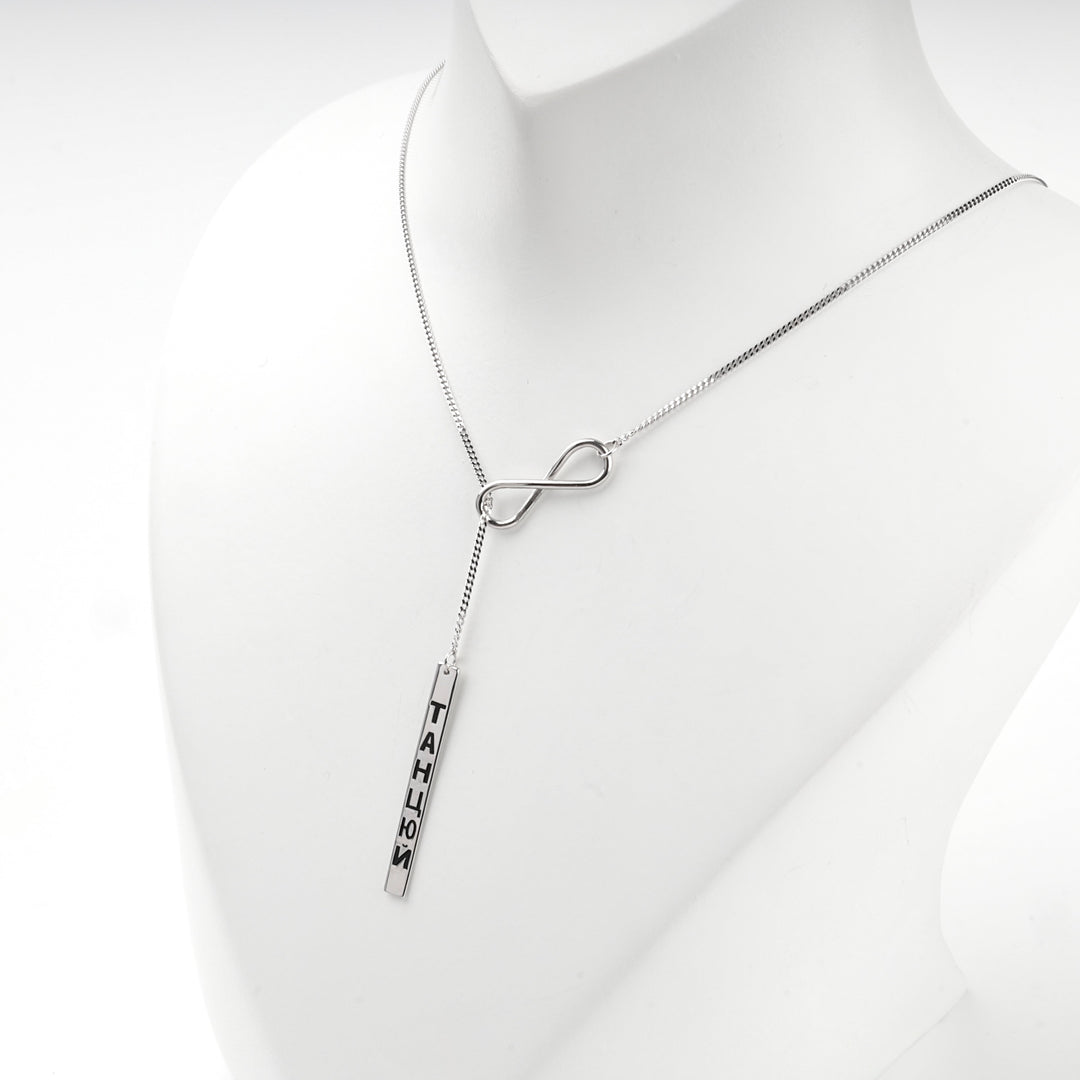 Angled close view of the infinity element and the drop