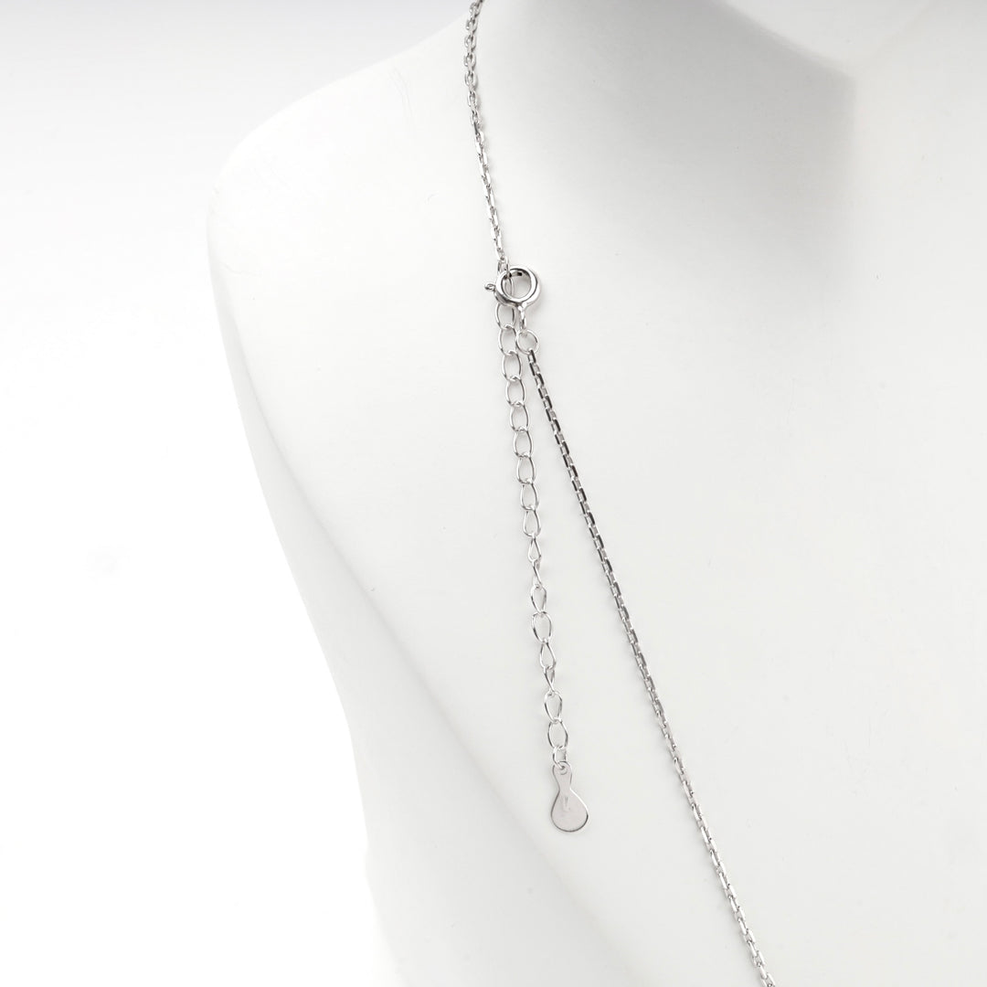 Back of the necklace showing the clasp and extender chain on a white bust