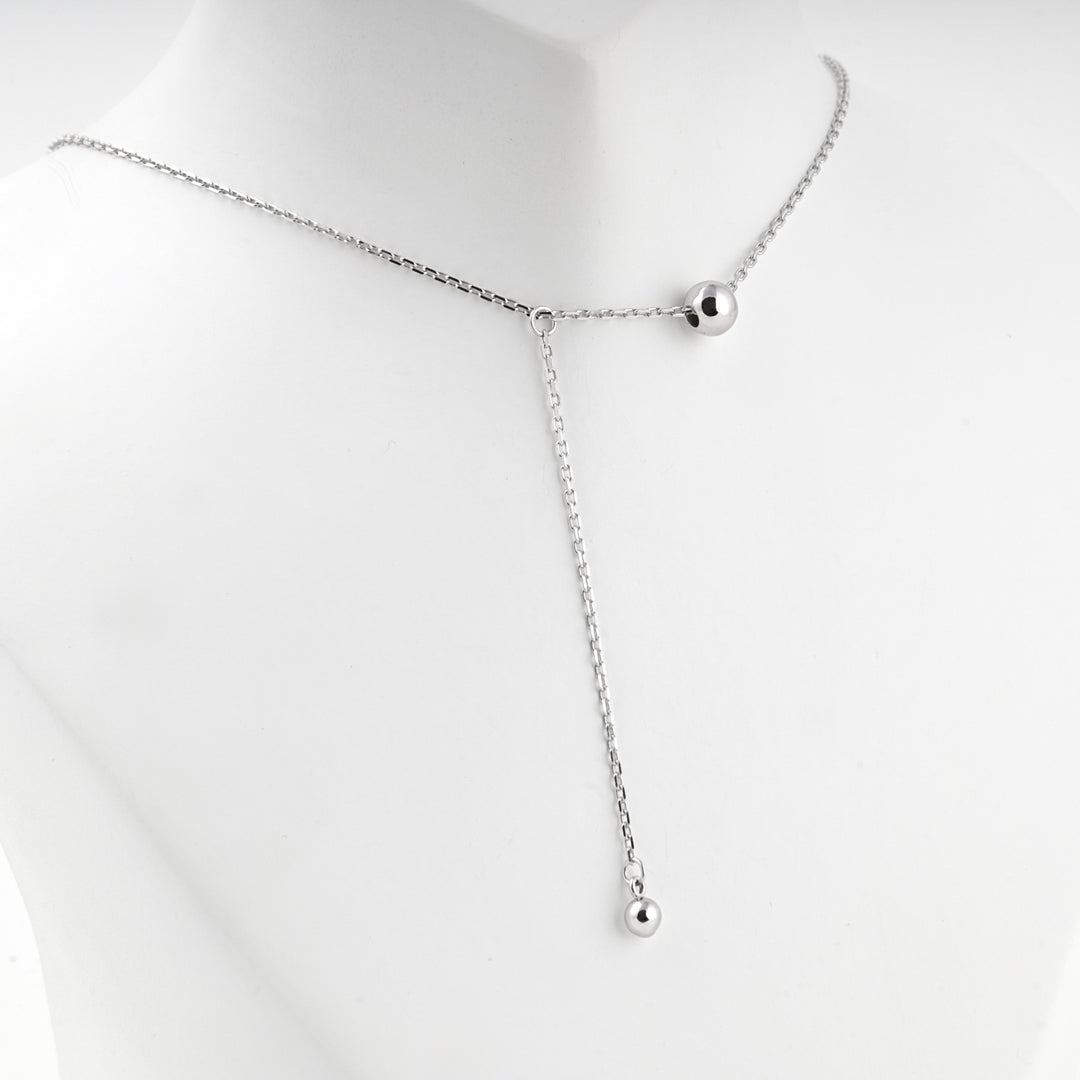 Y necklace with the ball drop hanging free, angled view