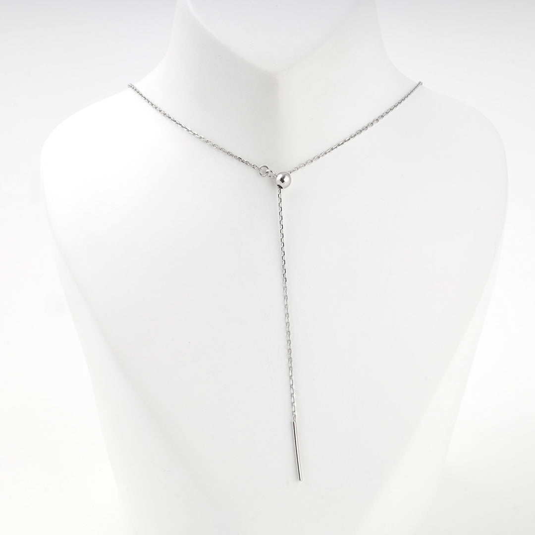Front view of the silver Y necklace showing the ball where the chain turns down
