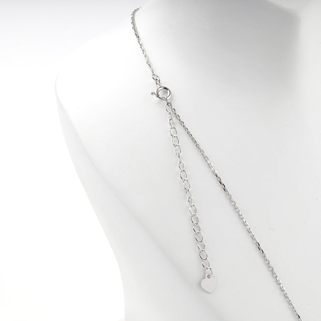 Back of the letter M necklace showing the clasp, extender chain and heart tag