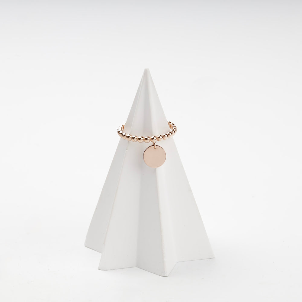 Beaded Ring with Disc Charm | 14K Rose Gold (585) — angled view