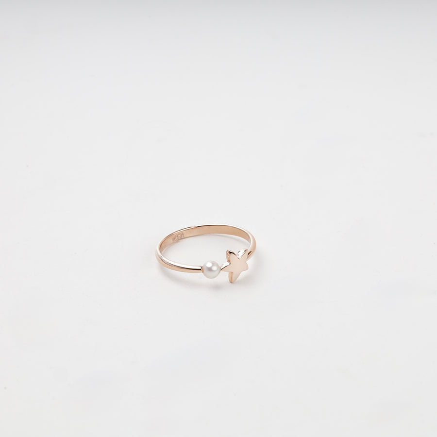 Open rose gold ring with star and pearl front view