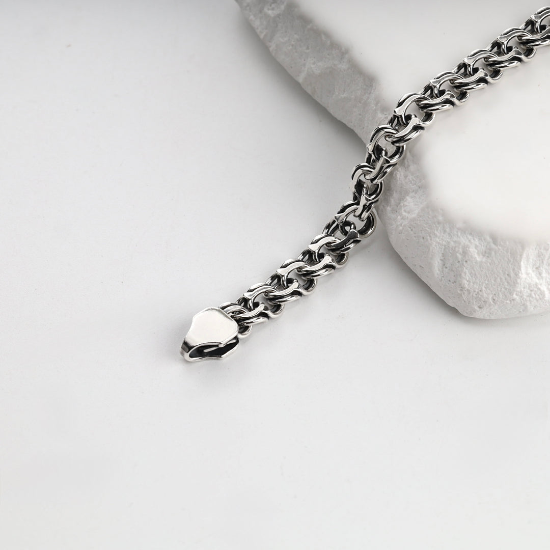 Polished Bismarck chain bracelet in sterling silver, overhead view