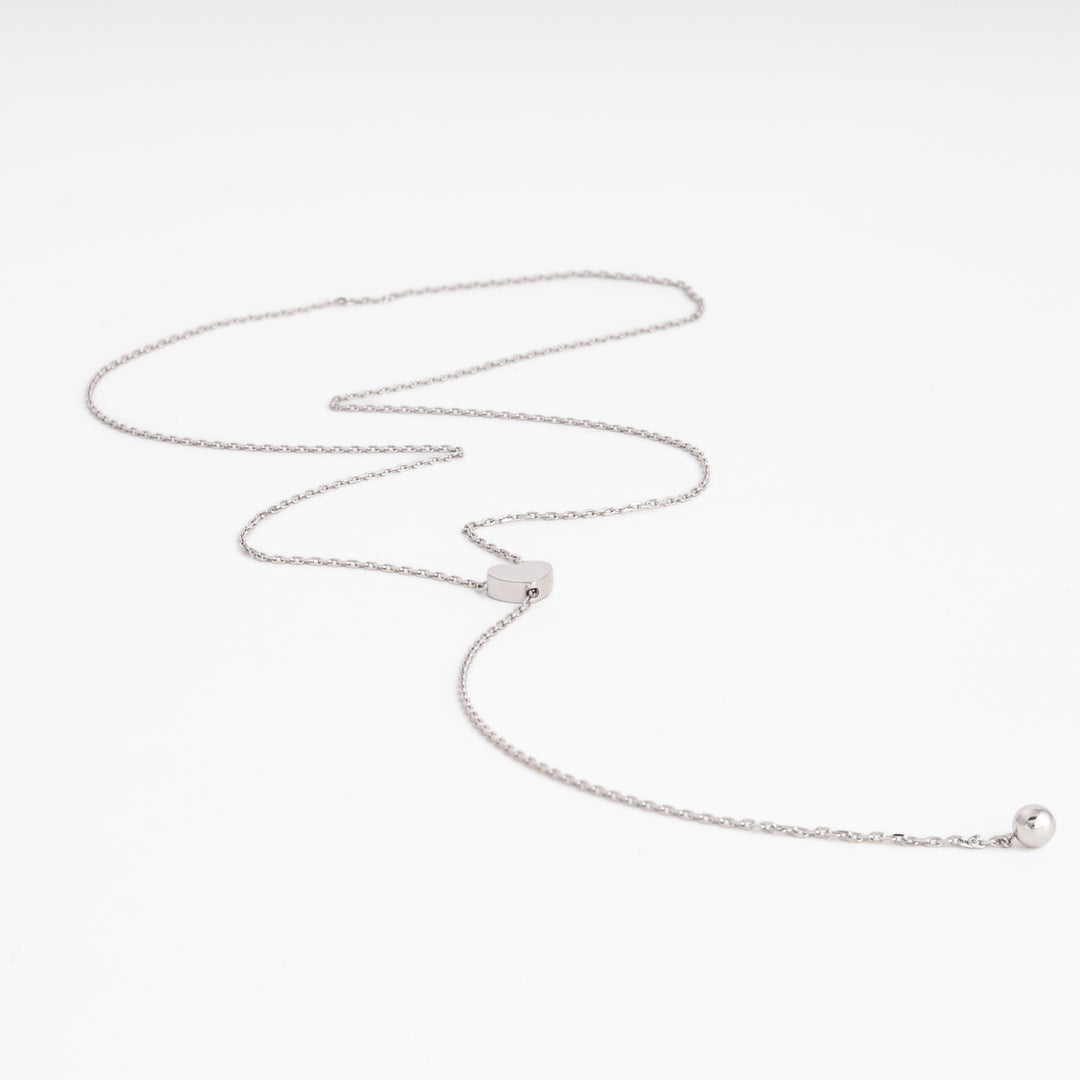 Silver rhodium heart lariat necklace on white background — Ukrainian Jewelry