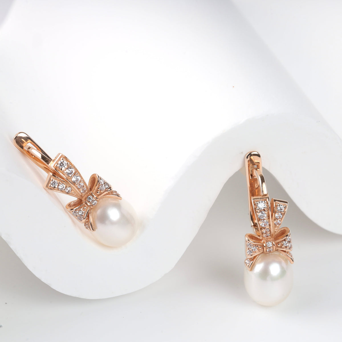 Pearl Bow Drop Earrings 14K (585) Rose Gold with Zirconia | Ukrainian Jewelry