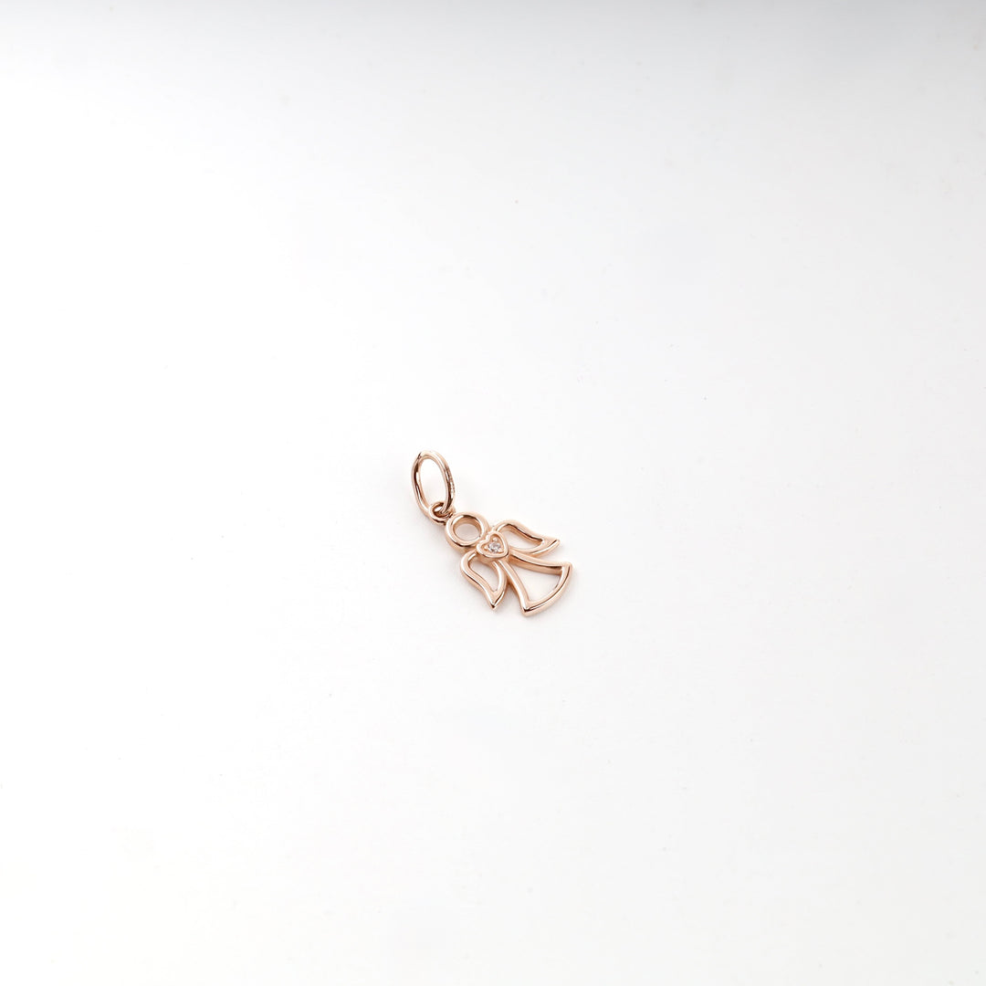 Rose gold openwork angel pendant with a heart and cubic zirconia, front view