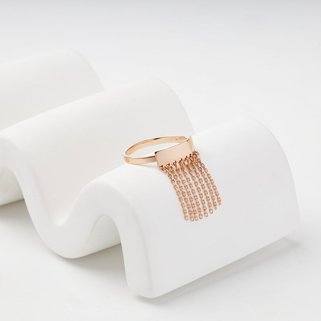 Rose gold fringe ring with chain tassels front view