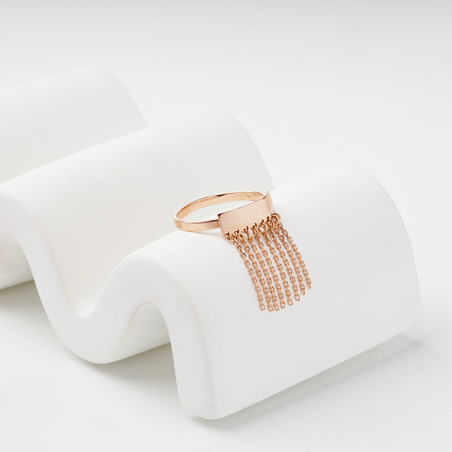 Rose gold fringe ring with chain tassels front view