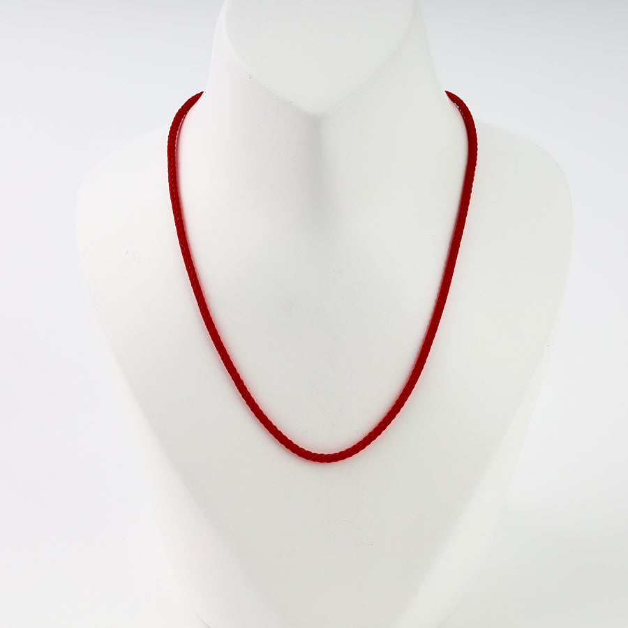 Red cord necklace with a simple 14k gold clasp on a display bust, Ukrainian Jewelry for everyday red cord necklace shoppers.