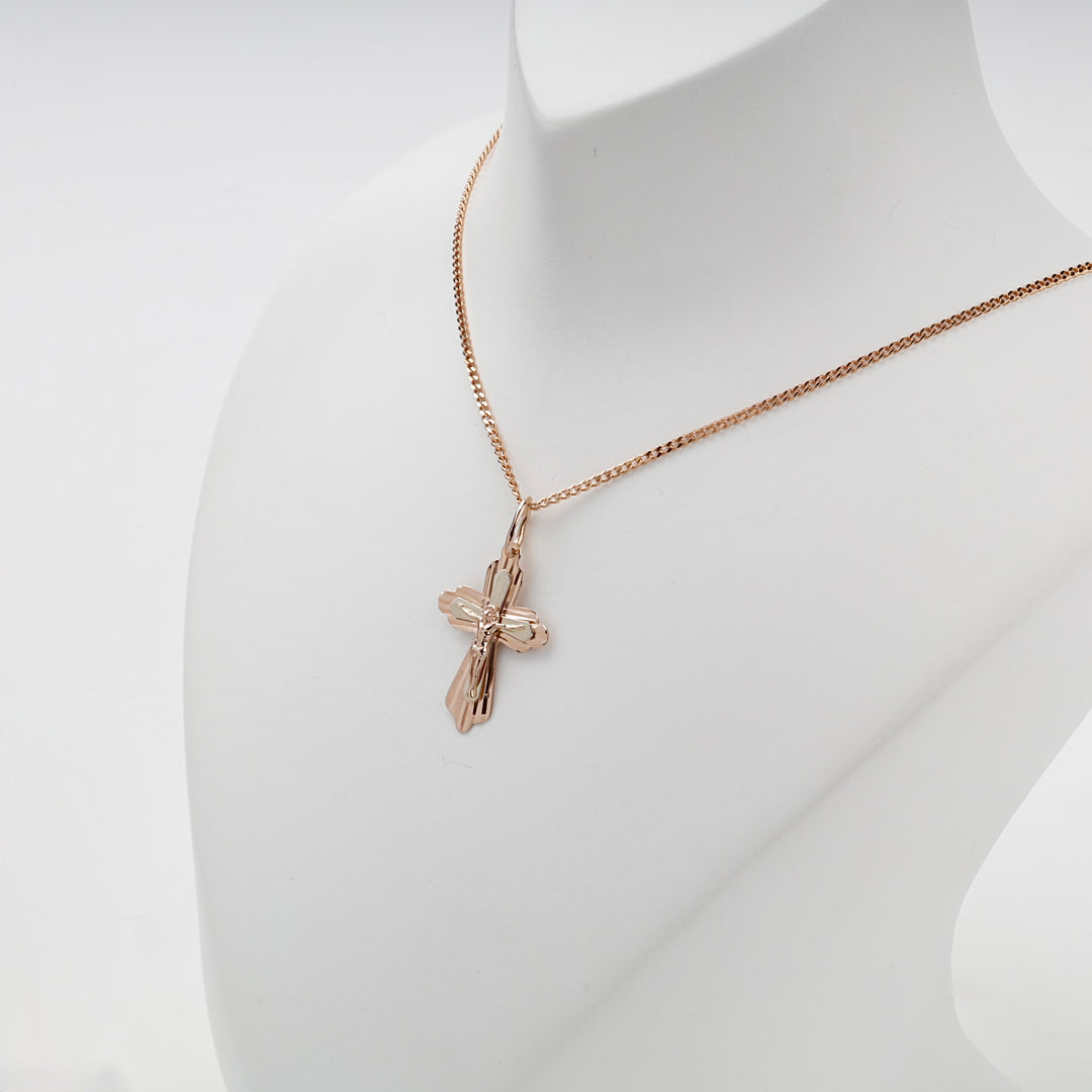 Reverse of the rose gold cross engraved Save and Protect