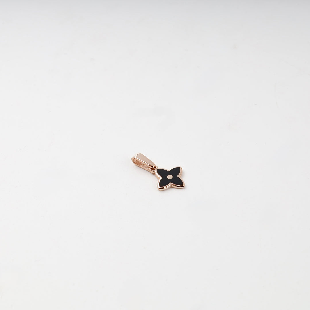 Rose gold black flower pendant lifestyle styling
