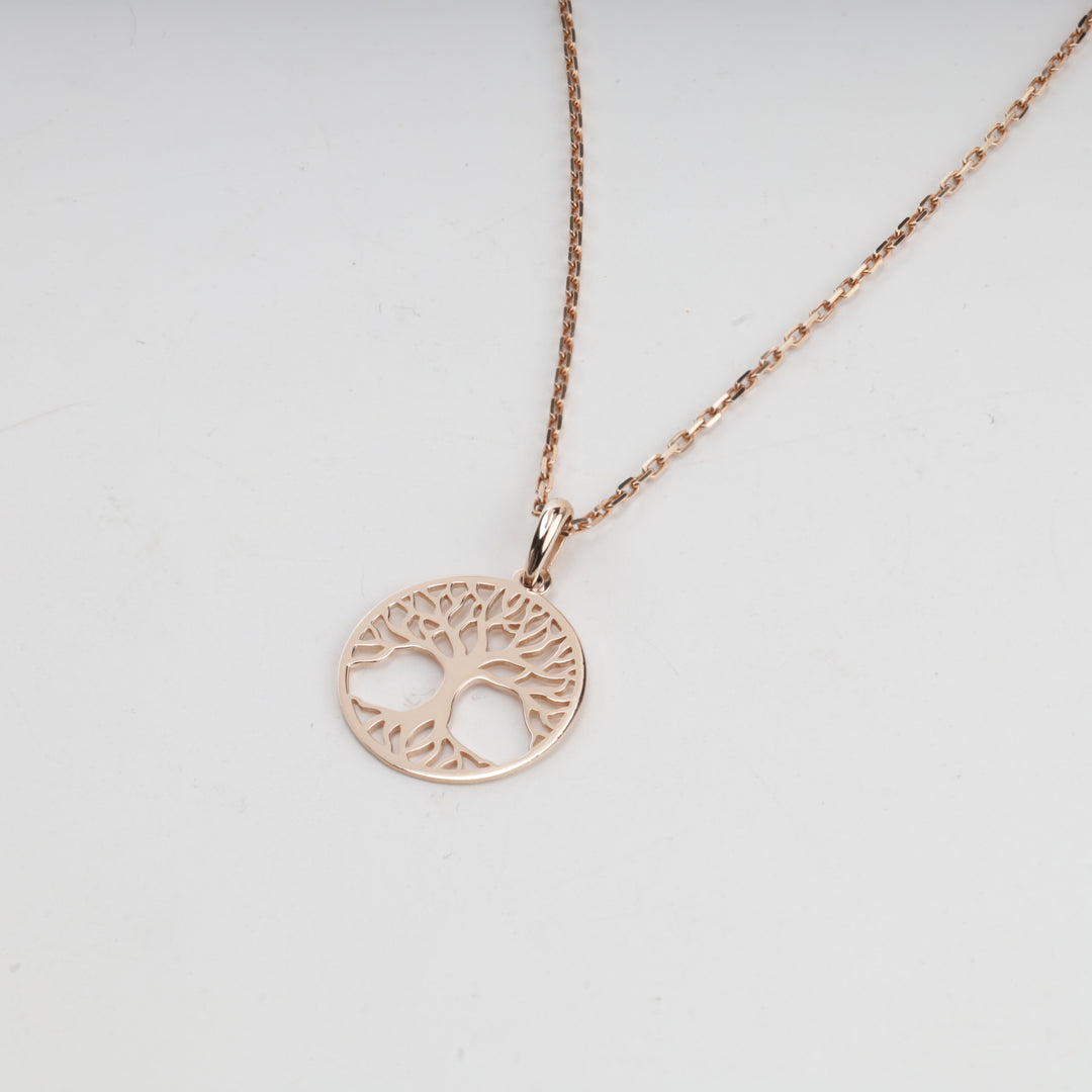 Rose gold round tree of life pendant on a chain, front view