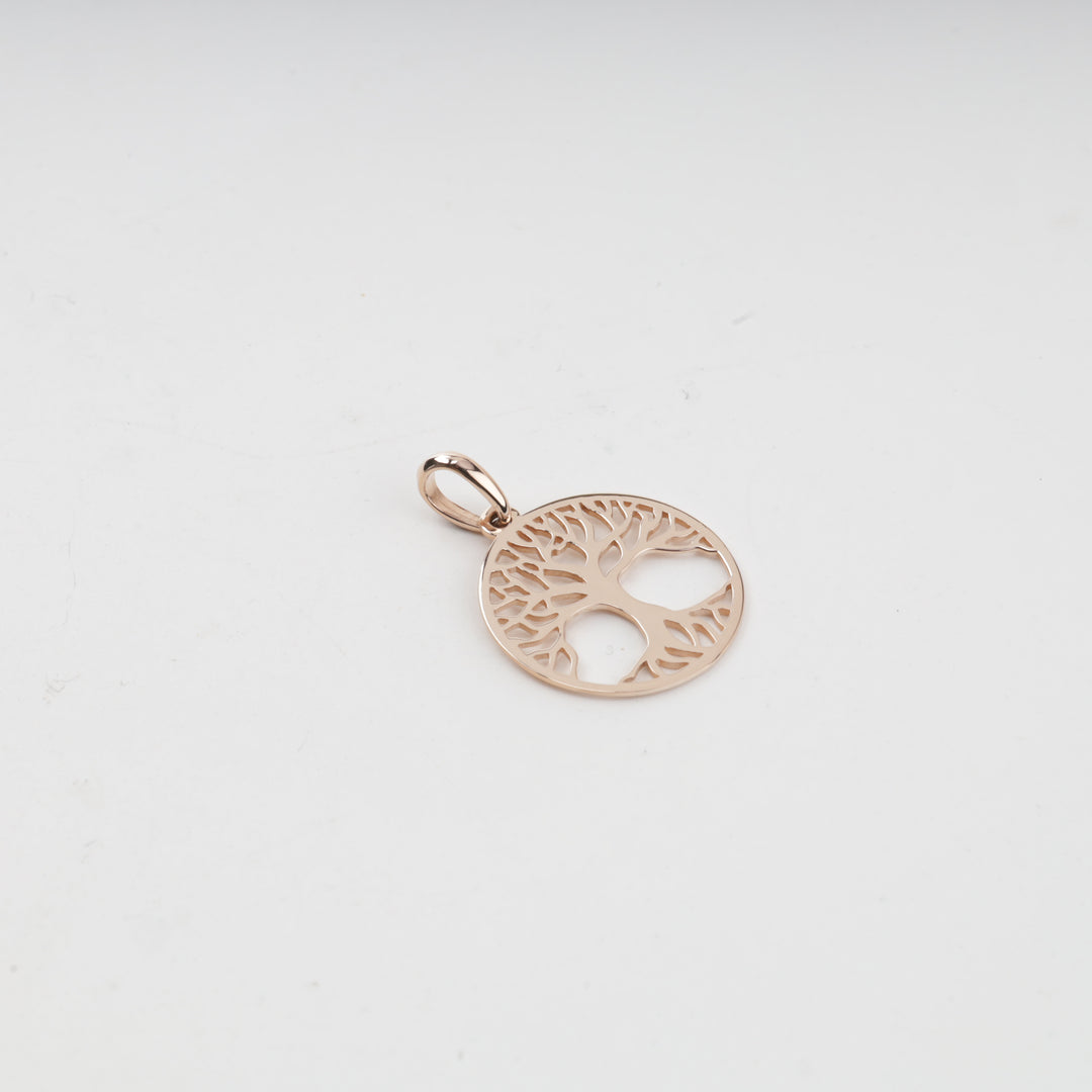 Rose gold tree of life pendant, overhead view