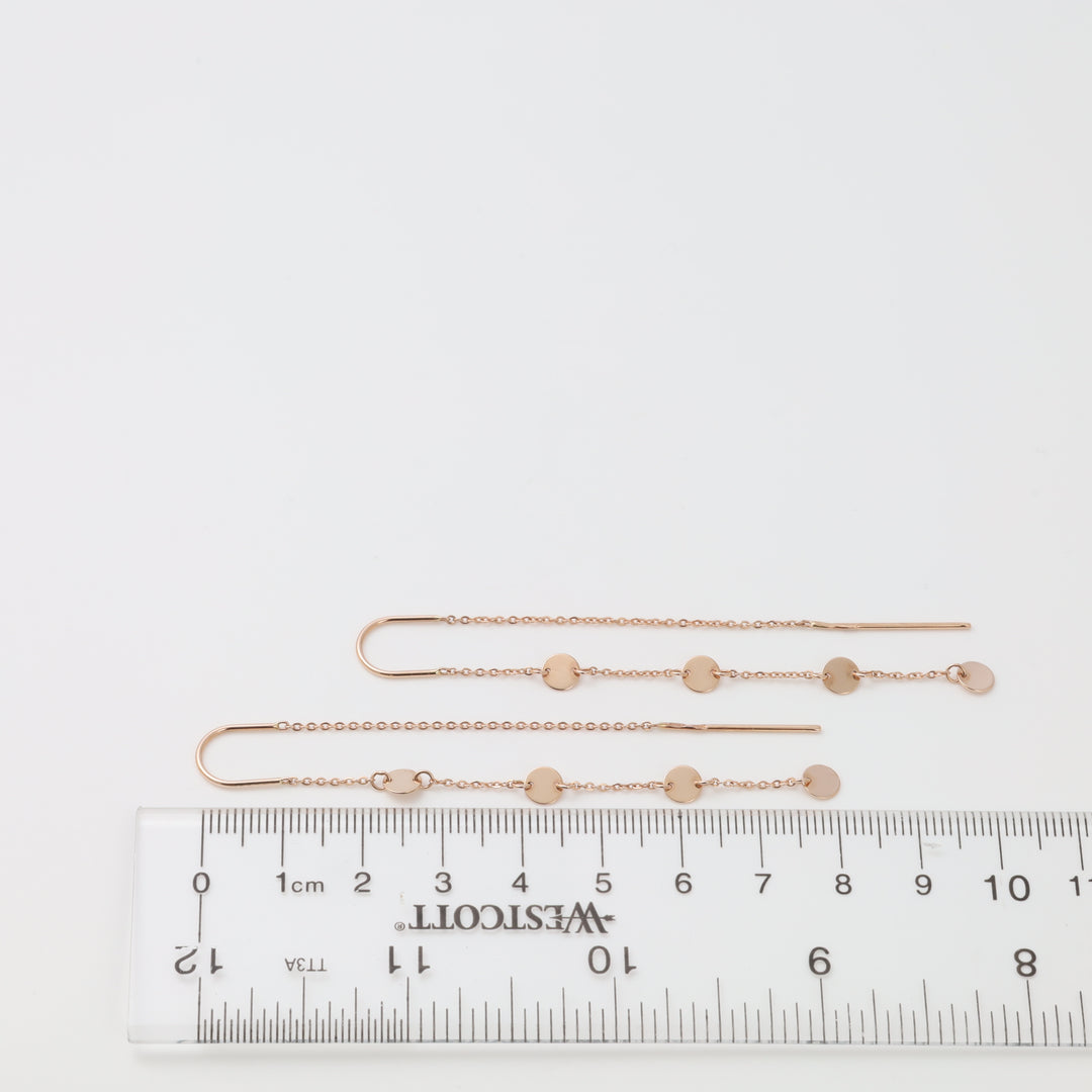 Rose gold threader earrings with disc charms on ruler 9cm