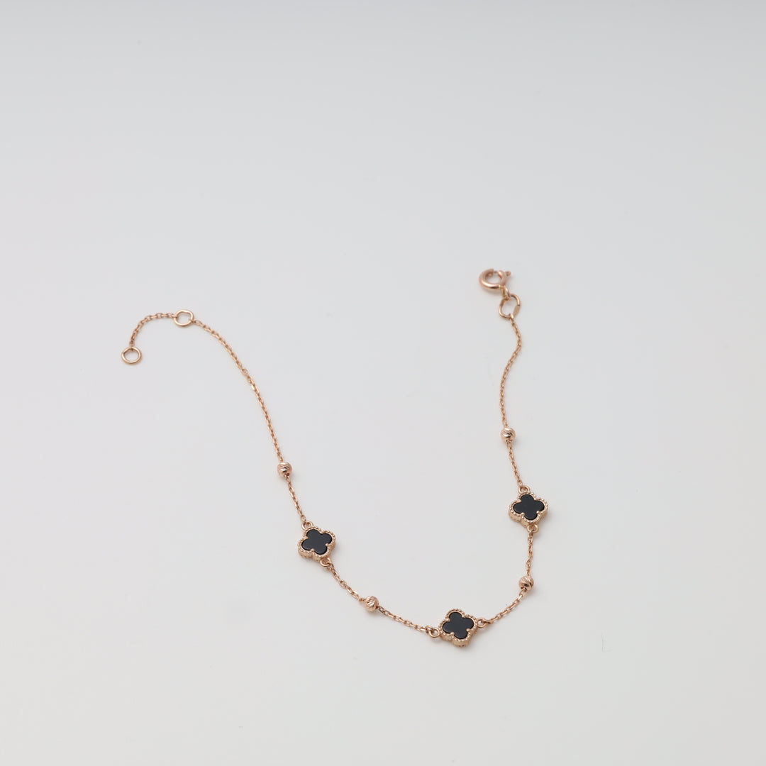 Браслет з чорними конюшинами та оніксом з рожевого золота 585 проби | Ukrainian Jewelry